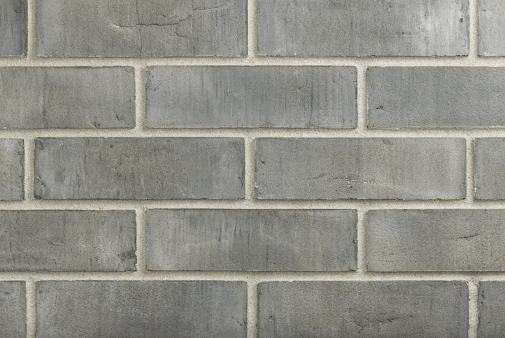 Фасадная плитка для цоколя: как выбрать оптимальный материал