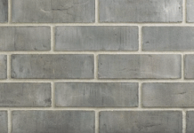 Фасадная плитка для цоколя: как выбрать оптимальный материал