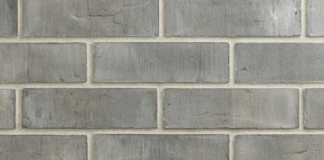 Фасадная плитка для цоколя: как выбрать оптимальный материал