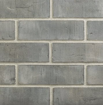 Фасадная плитка для цоколя: как выбрать оптимальный материал